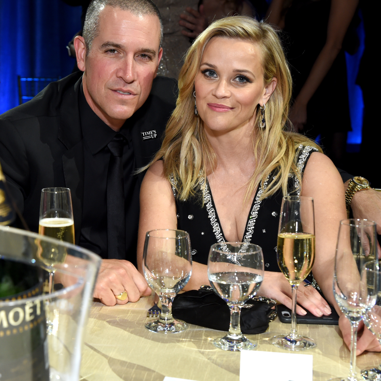  Talent agent Jim Toth (L) and producer-actor Reese Witherspoon attend Moet & Chandon celebrate The 23rd Annual Critics' Choice Awards at Barker Hangar on January 11, 2018 in Santa Monica, California 