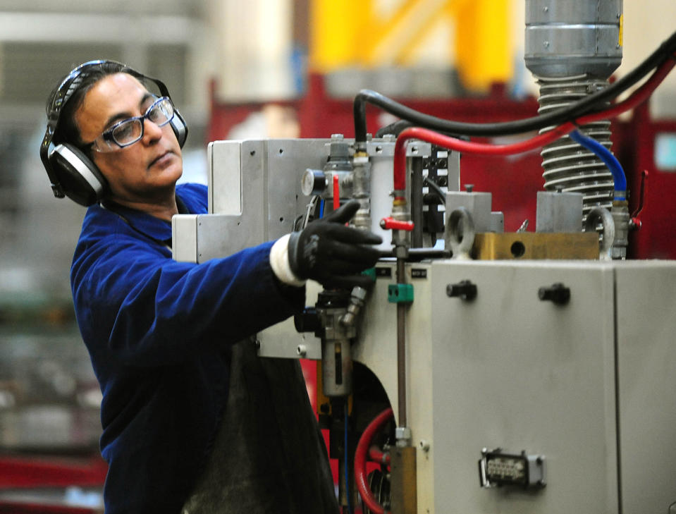 Photo of setter operator at work at UK manufacturing company in Birmingham