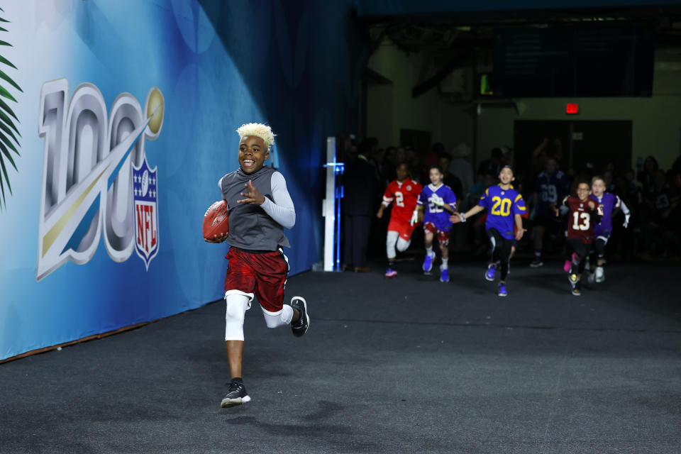 MIAMI, FLORIDA - FEBRUARY 02: Maxwell "Bunchie" Young runs on the field prior to Super Bowl LIV between the San Francisco 49ers and the Kansas City Chiefs at Hard Rock Stadium on February 02, 2020 in Miami, Florida. (Photo by Kevin C. Cox/Getty Images)