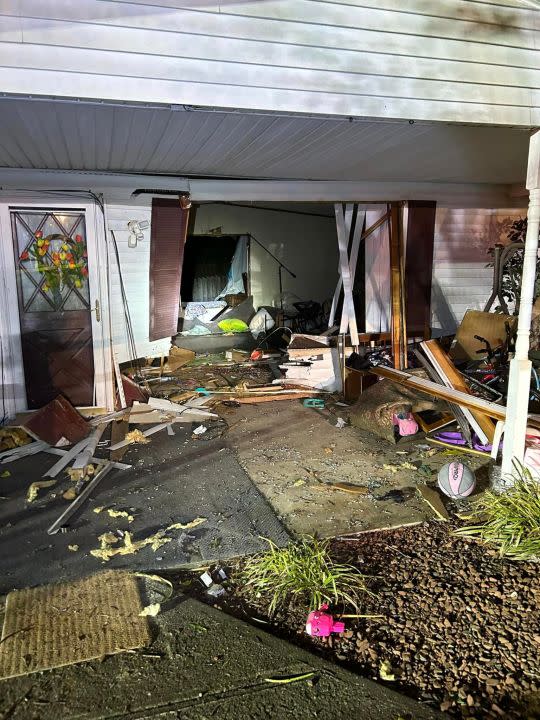 Damage to the front of a house after a Mustang crashed through it in Franklin County on April 23. (Photo Courtesy: Franklin County Department of Public Safety)