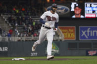 Minnesota Twins' Trevor Larnach runs towards home base after hitting a home run against the Detroit Tigers during the fourth inning of a baseball game Wednesday, May 25, 2022, in Minneapolis. (AP Photo/Stacy Bengs)