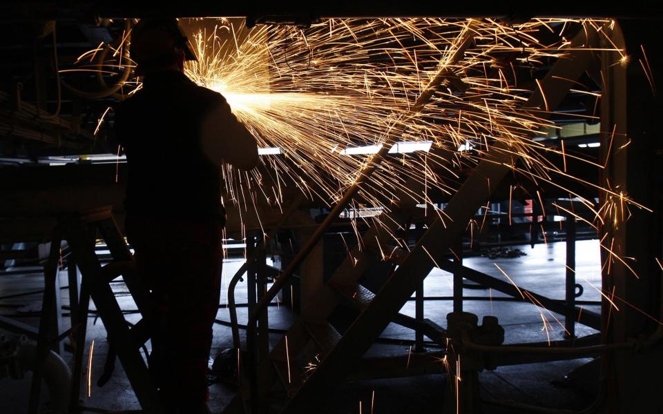 A shipyard worker at the Cammel Laird site in Birkenhead