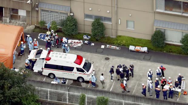 Emergency services attend the scene. Photo: Reuters