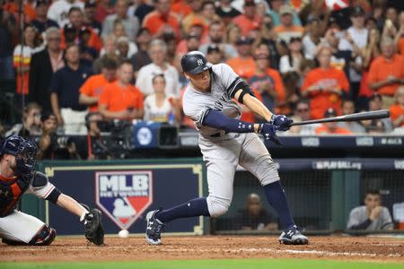 Oct 21, 2017; Houston, TX, USA; New York Yankees right fielder Aaron Judge (99) strikes out in the eighth inning during game seven of the 2017 ALCS playoff baseball series against the Houston Astros at Minute Maid Park. Thomas B. Shea-USA TODAY Sports