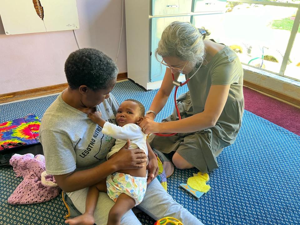 Saskatoon pediatrician Dr. Mahli Brindamour treats a baby during a recent six-month volunteer placement in the southern African country of Lesotho.