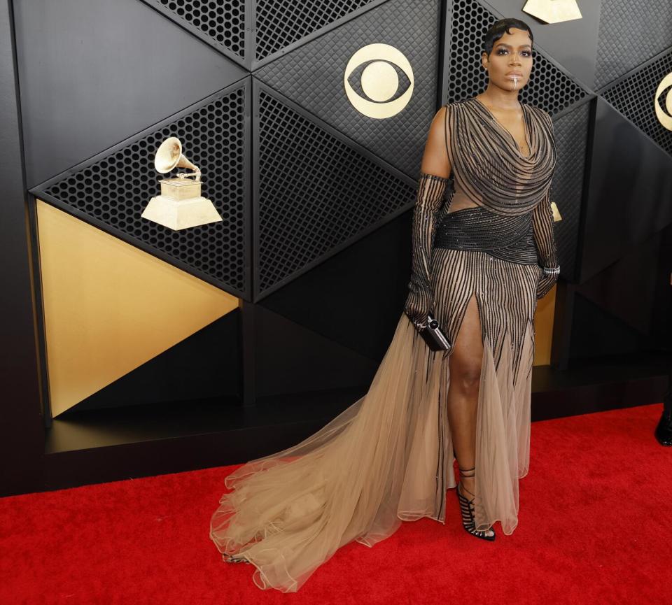 Fantasia Barrino wears a black and cream dress