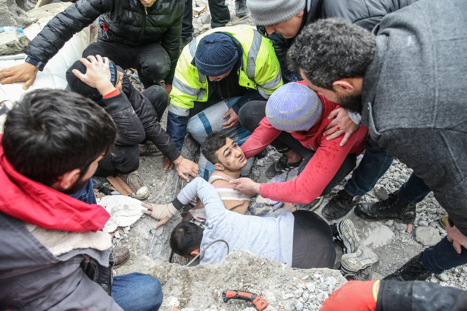 Mehmet Emin Ataoglu is rescued from the rubble of 6-story building in Hatay, Turkey.<span class="copyright">2023 Anadolu Agency</span>