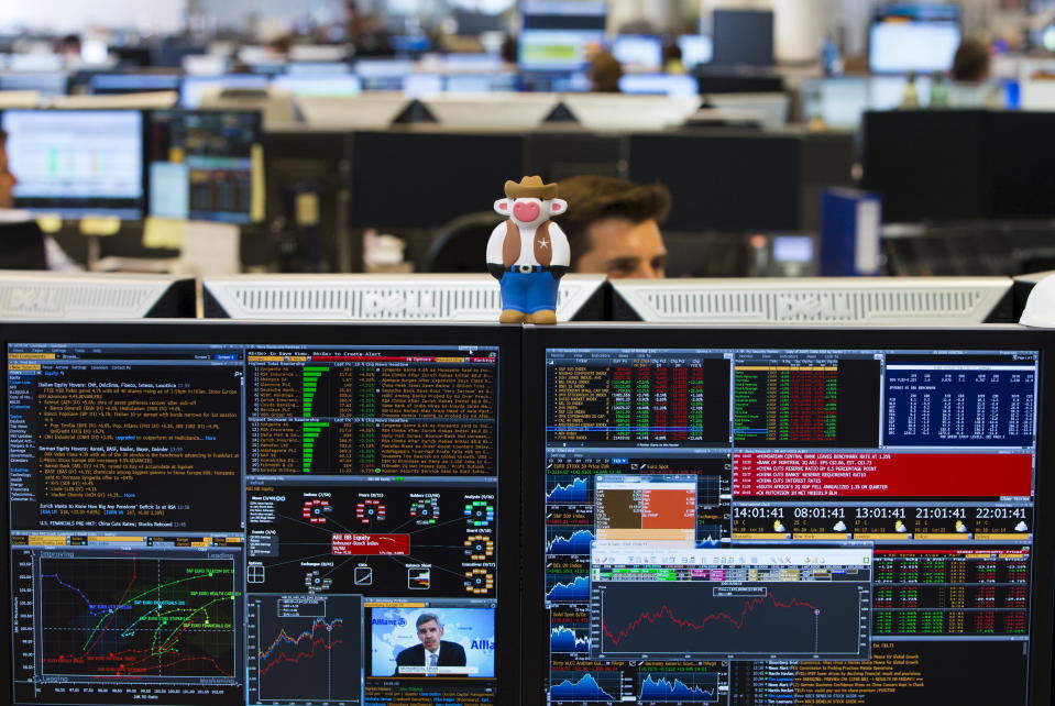 ISA investors A trader looks at screens on the KBC bank trading floor in Brussels, Belgium August 25, 2015. Volatile global markets got some respite from the latest blood-letting on Tuesday as bargain hunters nudged up Asian and European stocks, though China, at the center of the rout, was smashed again. REUTERS/Yves Herman