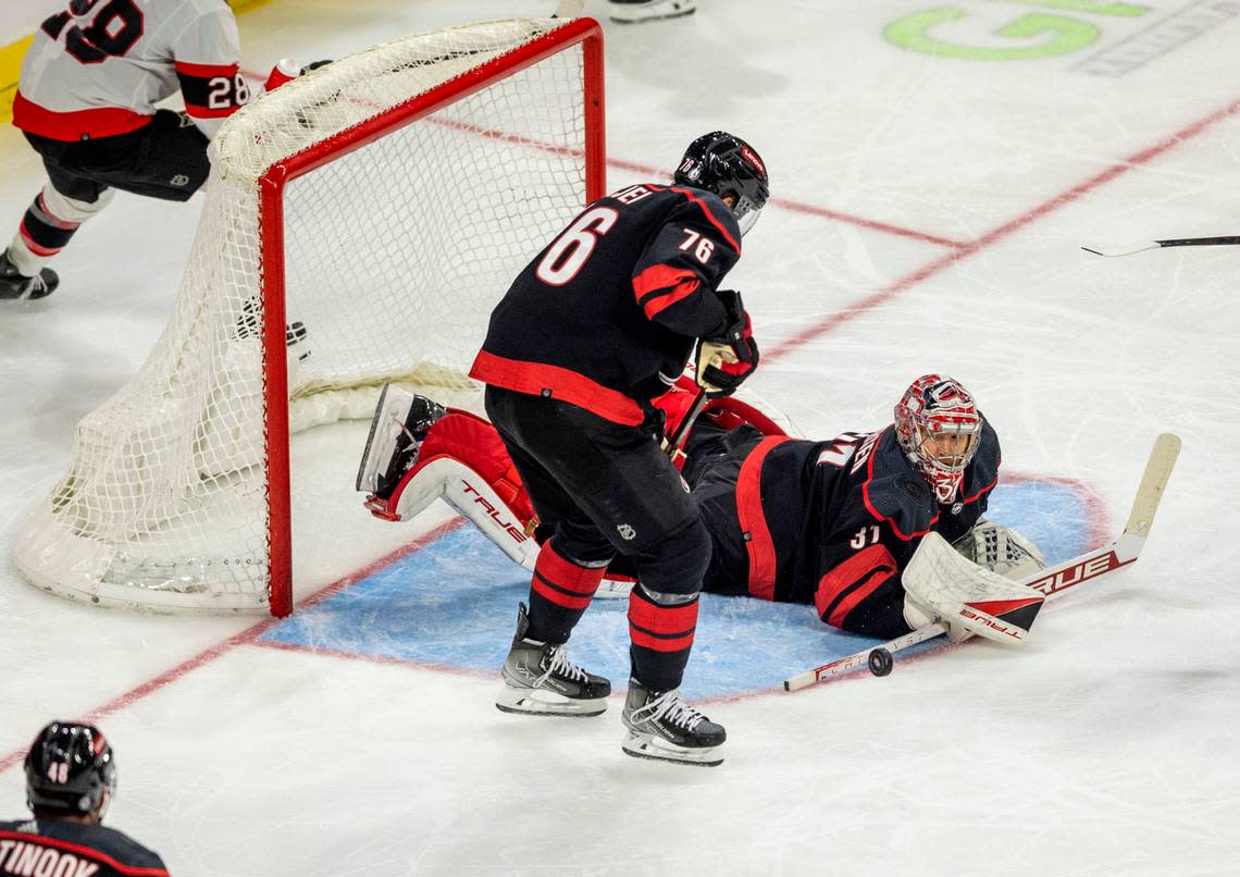 The Carolina Hurricanes goalie Frederik Andersen (31) stops a scoring attempt by the Ottawa Senators Drake Batherson (19) in the second period on Wednesday, October 11, 2023 at PNC Arena, in Raleigh N.C.