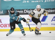 San Jose Sharks defenseman Brent Burns (88) shoots at the net against Vegas Golden Knights defenseman Nick Holden (22) during the first period of an NHL hockey game in San Jose, Calif., Saturday, Feb. 13, 2021. (AP Photo/Josie Lepe)