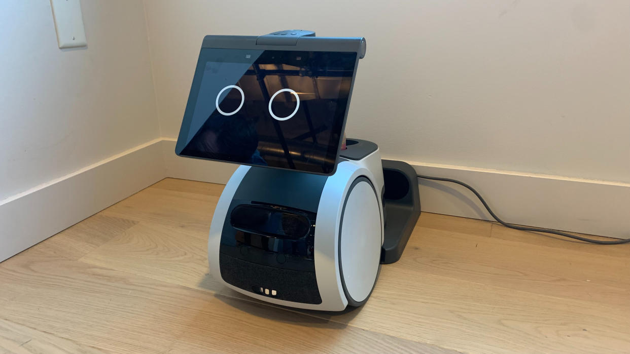  Amazon's Astro home bot on its charging station 