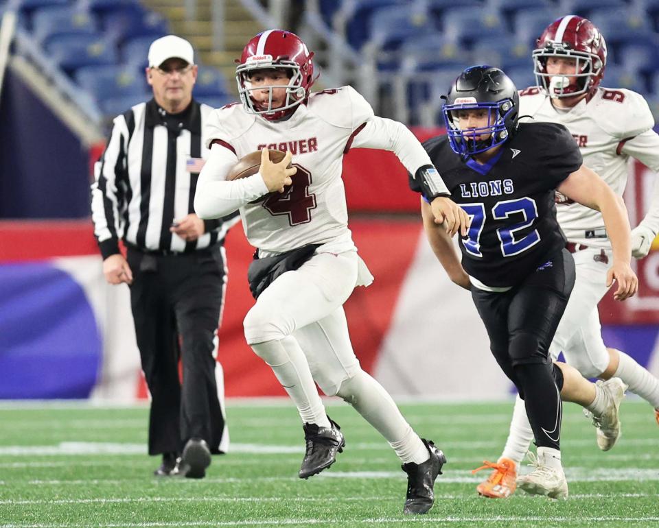 Carver quarterback Tyler Lennox carries the football in the Division 8 state title game versus West Boylston at Gillette Stadium on Wednesday, Nov. 29, 2023.