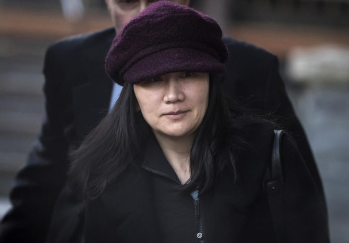 FILE- In this Jan. 29, 2019, file photo, Huawei chief financial officer Meng Wanzhou leaves her home to attend a court appearance in Vancouver, British Columbia. Canada said Friday, March 1, 2019, it will allow the U.S. extradition case against Wanzhou to proceed. She is due in court on March 6, at which time a date for her extradition hearing will be set. Meng is wanted in the U.S. on fraud charges that she misled banks about the company's business dealings in Iran. (Darryl Dyck/The Canadian Press via AP, File)