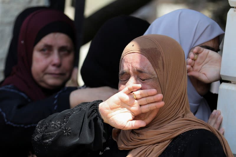 Relatives of the Palestinian man Salah Sawafta, who was killed during an Israeli raid in Tubas, cry during his funeral in Tubas