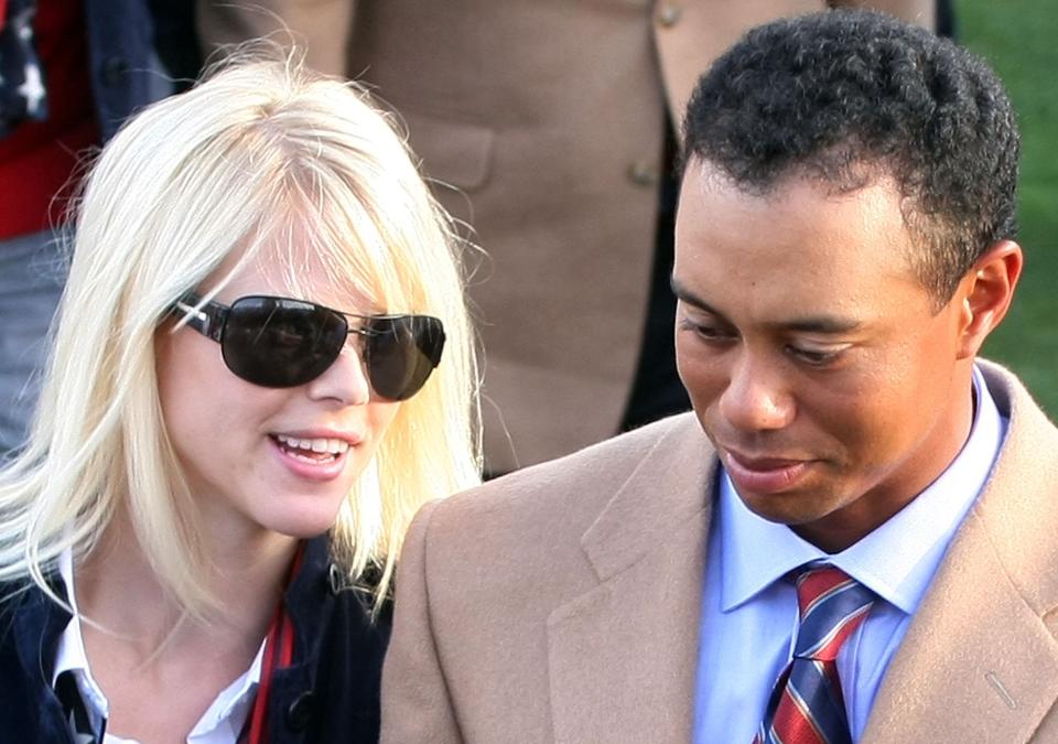 &nbsp;Tiger Woods of the U.S. Team walks with his wife Elin Woods during the opening ceremonies prior to the start of The Presidents Cup at The Royal Montreal Golf Club on September 26, 2007 in Montreal, Quebec, Canada. (Photo by Scott Halleran/Getty Images)