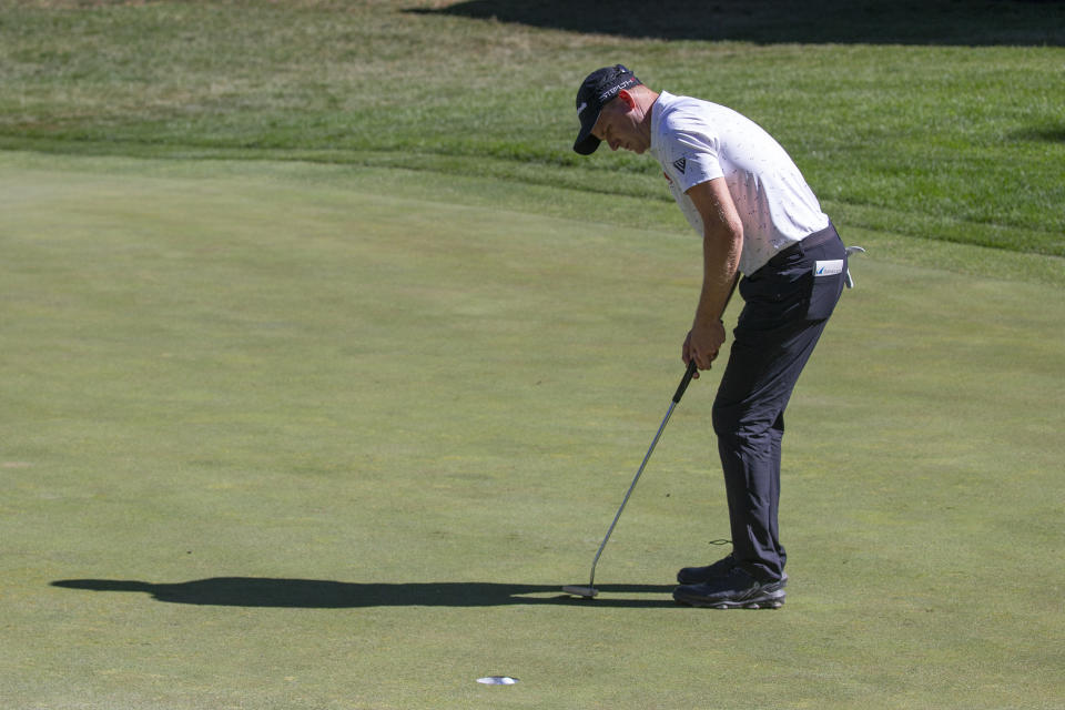 Patrick Rodgers putts on the ninth green during the first round of the Barracuda Championship golf tournament at Tahoe Mountain Club in Truckee, Calif., Thursday, July 20, 2023. (AP Photo/Tom R. Smedes)