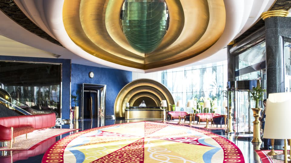 At Jumeirah Burj Al Arab, the hotel's opulence is on full display from the lobby (pictured) to its exclusive Presidential Suite. - Jumeirah Burj Al Arab