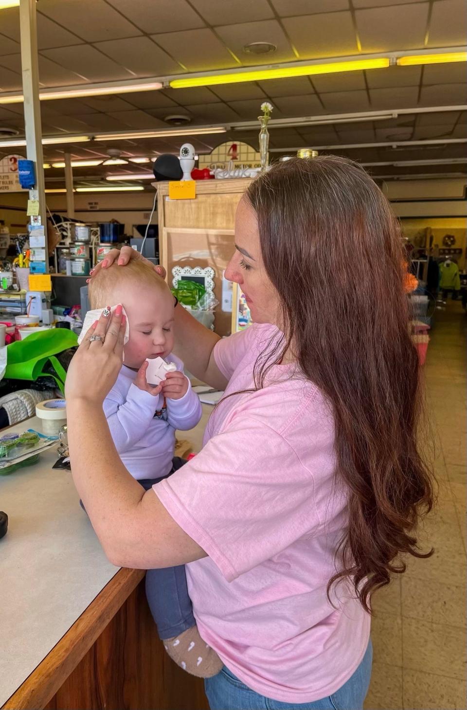 Tara Allen and her daughter Amelia get cleaned up to meet customers. Allen turned the former Frugality Thrift Store on Edgemoor Road in Powell, Tennessee, into The ReSale Rack Thrift Store on Oct. 1, 2023.