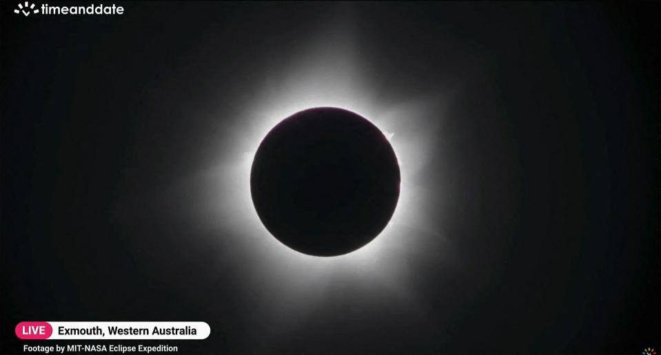 The moon blocks out the sun during a full solar eclipse in Western Australia's town of Exmouth. Professional astronomers and amateur cosmologists flocked to a remote part of Western Australia on April 20 to witness a total solar eclipse, with the moon blocking out the sun for 58 seconds.