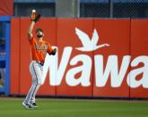 Mar 22, 2019; Dunedin, FL, USA; Baltimore Orioles right fielder Joey Rickard (23) catches a fly ball for the out on Toronto Blue Jays designated hitter Kendrys Morales (8) during the sixth inning of a game at Dunedin Stadium. Mandatory Credit: Butch Dill-USA TODAY Sports