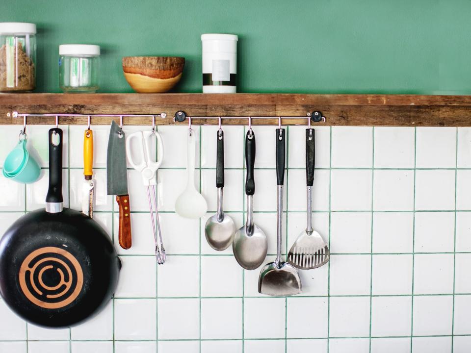 Kitchen utensils on work top in modern kitchen