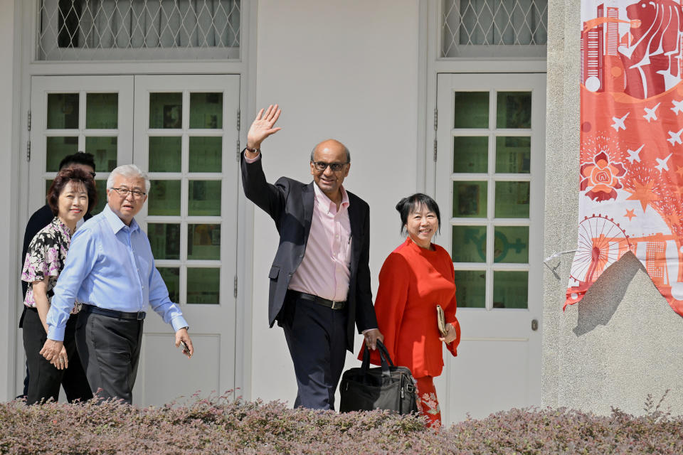 Presidential candidate Tharman Shanmugaratnam waves to the supporters as he arrives at the nomination centre for the 2023 Singapore presidential election.