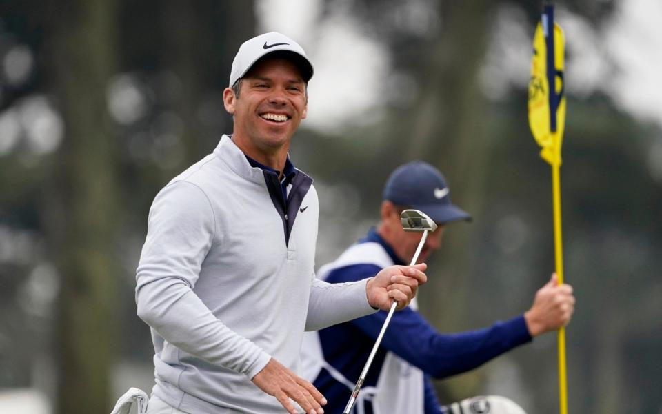 Paul Casey of England, smiles on the ninth hole during the final round of the PGA Championship  - AP