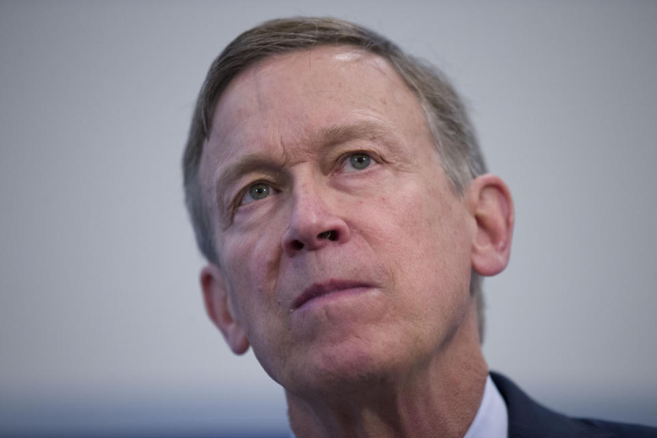 FILE - In this June 13 ,2019, file photo former Colorado Governor John Hickenlooper listens to a question during a media availability at the National Press Club in Washington. Hickenlooper was supposed to be Democrats' worry-free solution to the Colorado Senate race, but he's stumbled badly in the weeks leading up to the party's June 30 primary. (AP Photo/Alex Brandon, File)