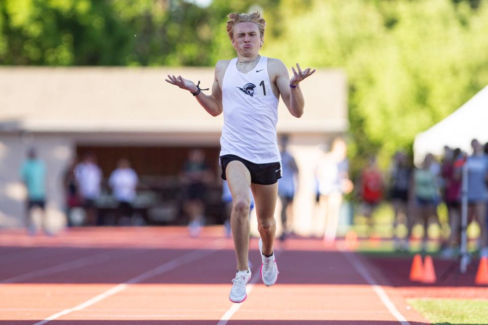 West Salem's Jack Meier celebrates after winning the 1500 meters during the CVC Track and Field District Championships at McCulloch Stadium on Friday, May 10, 2024, in Salem.