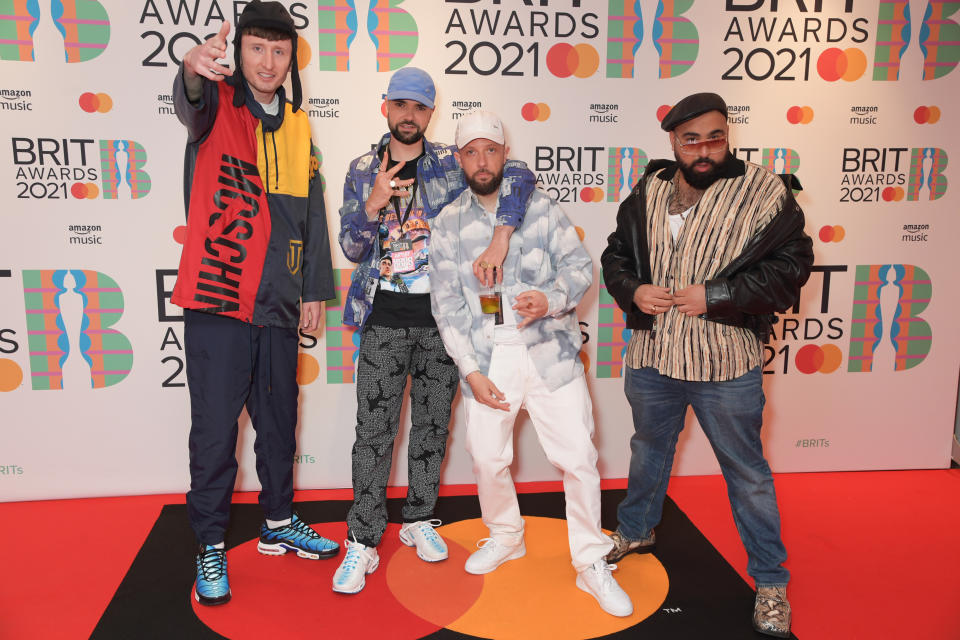 LONDON, ENGLAND - MAY 11:  (L-R) Steve Stamp, Allan Mustafa aka MC Grindah, Hugo Chegwin and Asim Chaudhry aka Chabuddy G arrive at The BRIT Awards 2021 at The O2 Arena on May 11, 2021 in London, England.  (Photo by David M. Benett/Dave Benett/Getty Images)