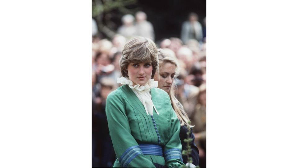   Lady Diana Spencer, wearing a green dress with a pie crust frill collar, during a visit to Broadlands in 198. The former wife of King Charles also wore a a pie crust collar.