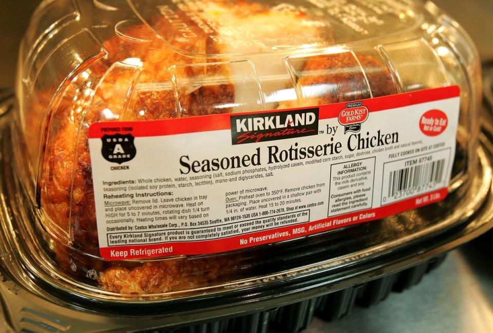A Kirkland Signature premium brand roasted rotisserie chicken sits at a Costco store in Niles, Illinois. Changes are coming to the popular product (Getty Images)