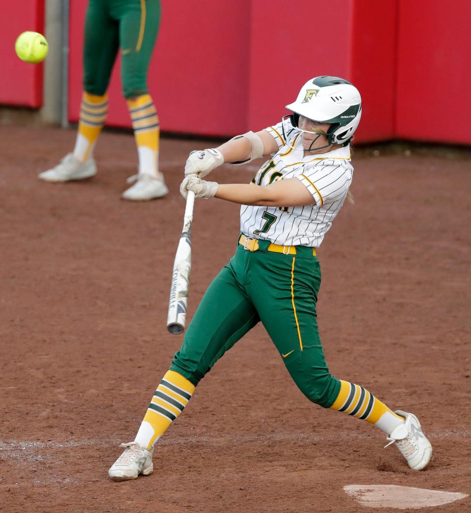 Freedom's Lauren Scheibe (7) drives in the game-winning run with a sacrifice fly against New London during a WIAA Division 2 state semifinal softball game Friday at Goodman Diamond in Madison.