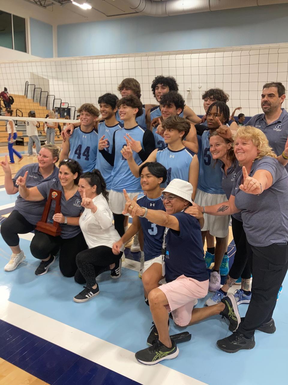 The Dr. Joaquín García boys volleyball team celebrates its district championship win over Lake Worth on May 2, 2024.