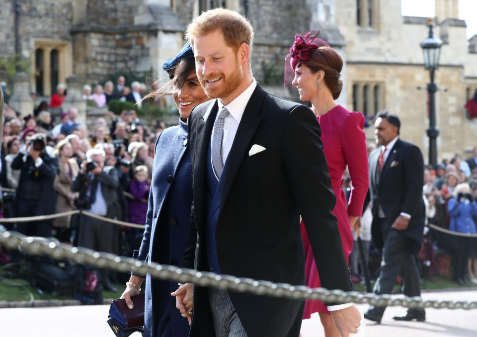 The Duke and Duchess of Sussex held hands as they left the chapel. Source: Getty