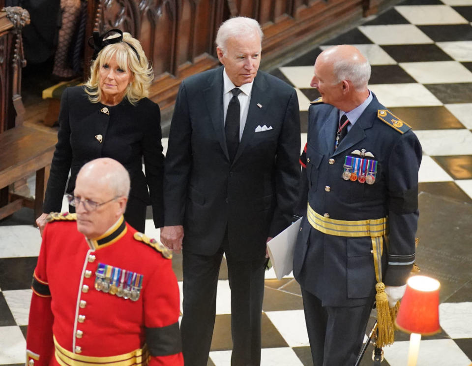 US President Joe Biden and first lady Jill Biden arrive inside Westminster Abbey in London on September 19, 2022, for the State Funeral Service for Britain's Queen Elizabeth II. - Leaders from around the world will attend the state funeral of Queen Elizabeth II. The country's longest-serving monarch, who died aged 96 after 70 years on the throne, will be honoured with a state funeral on Monday morning at Westminster Abbey. (Photo by Dominic Lipinski / POOL / AFP) (Photo by DOMINIC LIPINSKI/POOL/AFP via Getty Images)