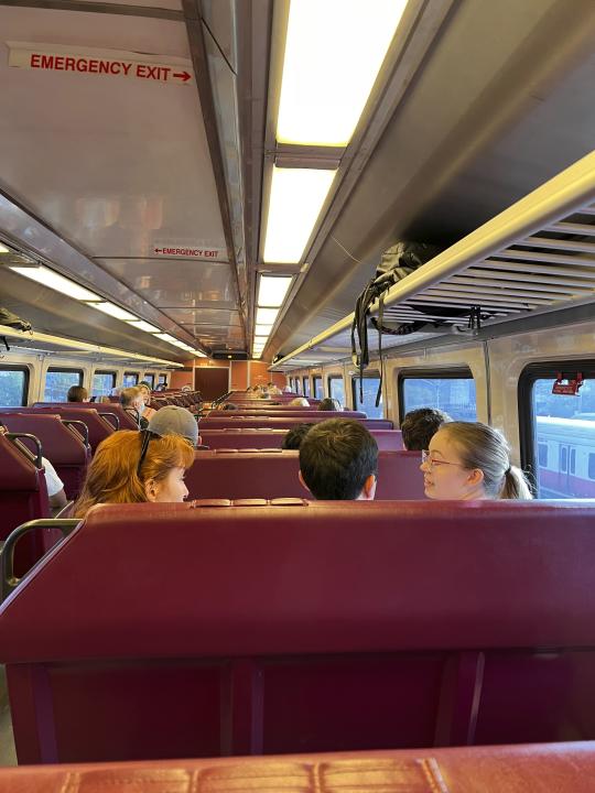 Passengers ride aboard the Cape Flyer, a weekend passenger train to Cape Cod on July 24, 2022. It runs during the weekends of summer until Labor Day, from Boston to Hyannis with a handful of stops in between. (Tracee Herbaugh via AP)