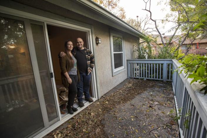 CANOGA PARK, CA-DECEMBER 5, 2022: Christine and Michael Hawkins are photographed at their recently purchased condo in Canoga Park. The Hawkins took out a mortgage at the top of their budget and planned to refinance when rates dropped to free up cash. But with prices now falling they are worried they won't be able to refinance. (Mel Melcon / Los Angeles Times)