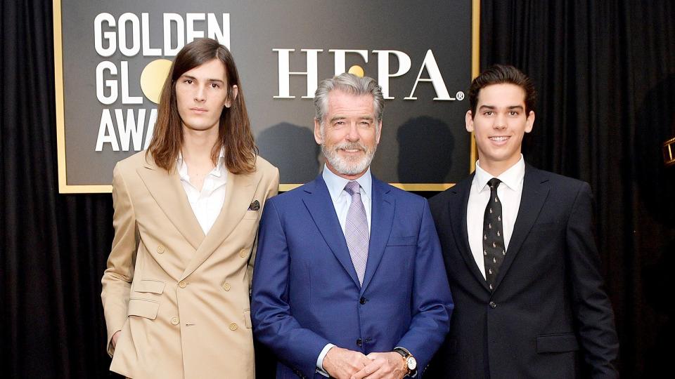 Pierce Brosnan (C) poses with Golden Globe Ambassadors Dylan Brosnan (L) and Paris Brosnan onstage during the Hollywood Foreign Press Association and The Hollywood Reporter Celebration of the 2020 Golden Globe Awards Season and Unveiling of the Golden Globe Ambassadors at Catch on November 14, 2019 in West Hollywood