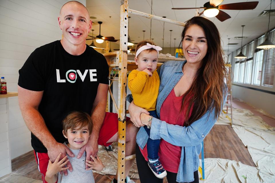 Donut Love co-owners Mike and Stephanie Oliveira, with their children Cash and Magnolia, at the point where they were opening their newest venture, the Comfort Baking Company in the former Lobster Boat Restaurant location in the Exeter Commons plaza at 75 Portsmouth Ave.