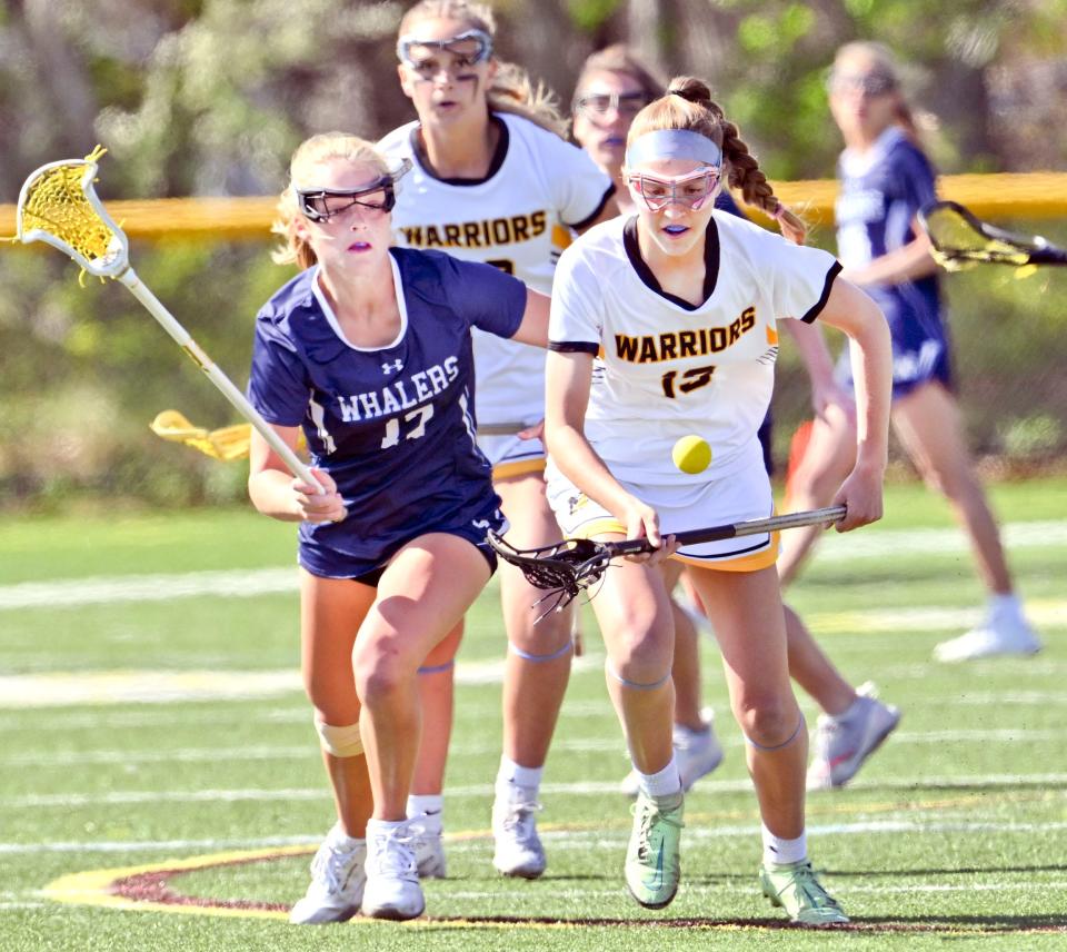 Julia Kipperman of Nauset controls the ball from Bailey Lower of Nantucket.
