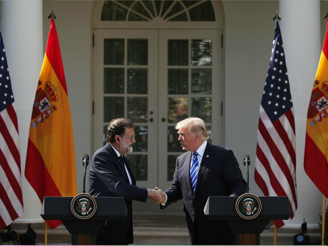 Donald Trump and Spanish Prime Minister Mariano Rajoy shake hands during a joint news conference at White House 26 September: Getty