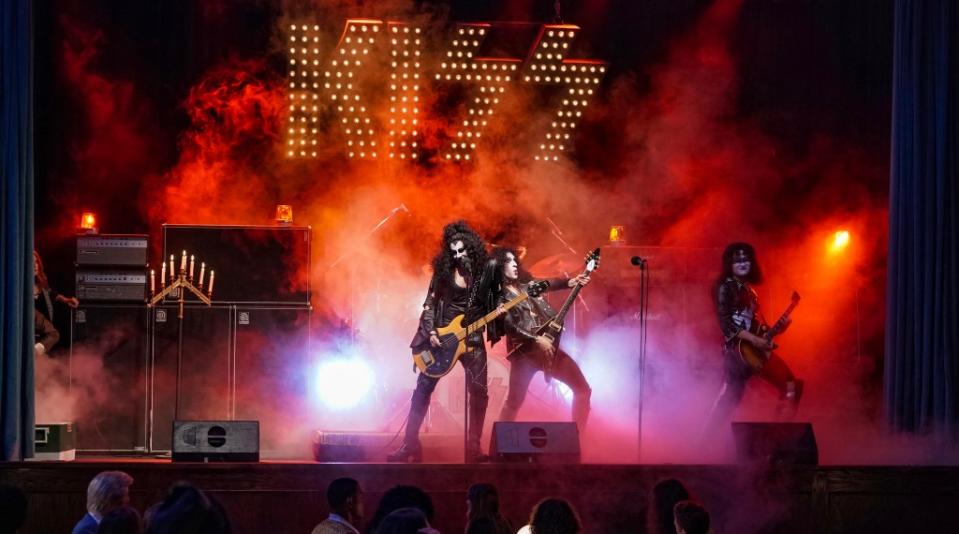 Casey Likes and Sam Nelson Harris (center) as Gene Simmons and Paul Stanley (Courtesy Spinning Gold)