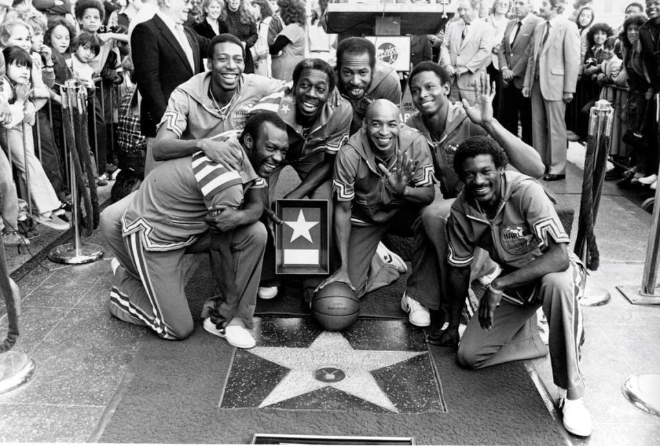 Dallas Thornton, who starred at Kentucky Wesleyan College, played for the Harlem Globetrotters from 1970-83. Here, the Globetrotters were honored with a star in the Hollywood Walk of Fame in 1982. Posing from left to right were, Billy Hobley, Thornton, Hubert “Geese” Ausbie, Nate Branch, Fred “Curly” Neal, Robert Paige and Gator Rivers.