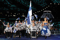 LONDON, ENGLAND - AUGUST 29: Athlete Leo-Pekka Tahti of Finaldn carries the flag during the Opening Ceremony of the London 2012 Paralympics at the Olympic Stadium on August 29, 2012 in London, England. (Photo by Dan Kitwood/Getty Images)