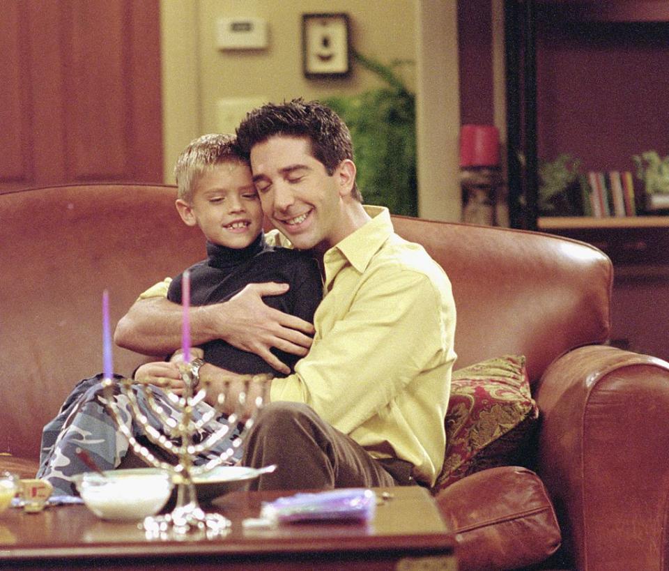 Cole Sprouse and David Schwimmer star in "Friends" episode "The One with the Holiday Armadillo," which premiered on Dec. 14, 2000. (Photo: NBCU Photo Bank)