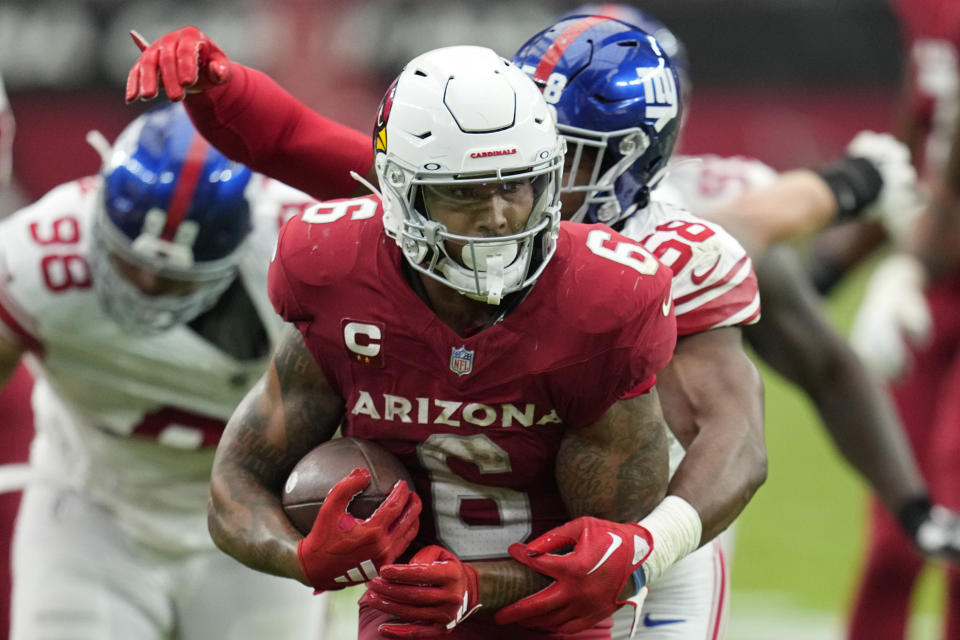 Arizona Cardinals running back James Conner (6) runs for a first down against the New York Giants during the second half of an NFL football game, Sunday, Sept. 17, 2023, in Glendale, Ariz. (AP Photo/Ross D. Franklin)