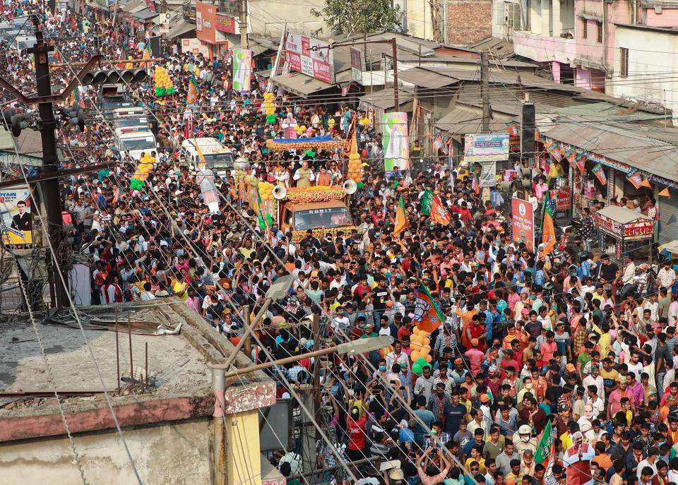 Islampur: Union Home Minister and senior BJP leader Amit Shah during an election campaign roadshow for party candidates in Islampur on Tuesday, 13 April.