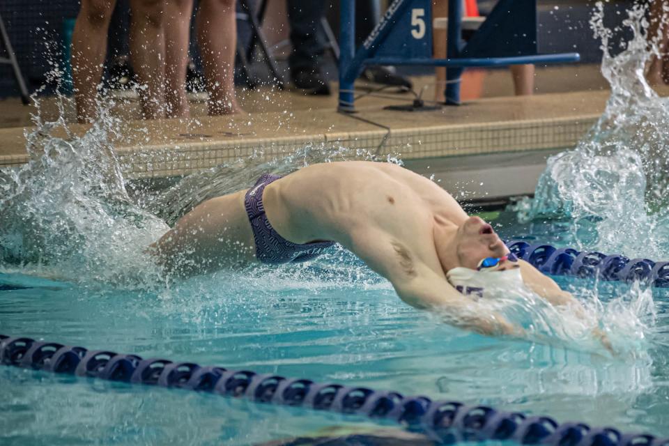 Lakeview's Cameron Lott competes in the 200 Yard Medley Relay at the All-City Swimming and Diving meet hosted at Harper Creek High School on January 15, 2022.