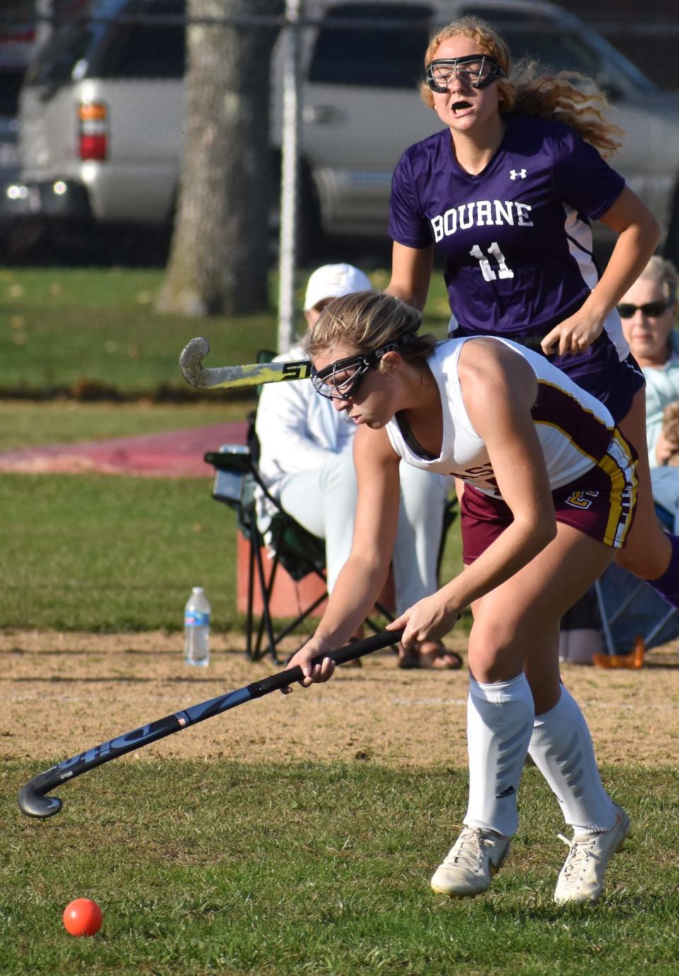 Case's Megan Smith runs after the ball against Bourne in their field hockey game in Swansea on Wednesday.